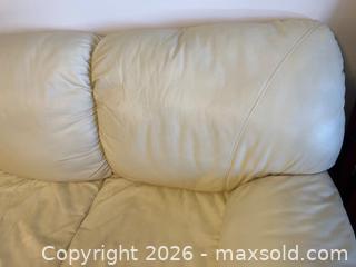 MaxSold Auction: Off-White Leather Three-Seat Sofa with Decorative Throw Pillows - Leeds And The Thousand Islands (Ontario, Canada) PARTNER MANAGED Downsizing Online Auction - Main Street