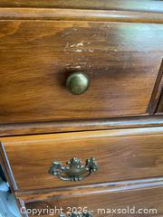 MaxSold Auction: Wooden Chest of Drawers with Seven Drawers and Metal Pulls - Leeds And The Thousand Islands (Ontario, Canada) PARTNER MANAGED Downsizing Online Auction - Main Street