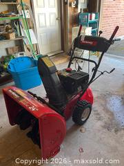 MaxSold Auction: Yard Machines 24-Inch Two-Stage Snow Blower with 179cc Powermore Engine - Leeds And The Thousand Islands (Ontario, Canada) PARTNER MANAGED Downsizing Online Auction - Main Street