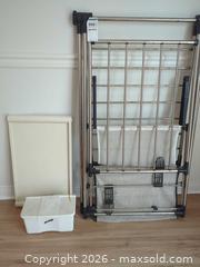 MaxSold Auction: Folding Metal Clothes Drying Rack with Storage Bin & Tray - Central Saanich (British Columbia, Canada) PARTNER MANAGED Moving Online Auction - Polo Park Crescent