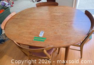 MaxSold Auction: Mid-Century Modern Dining Table with 4 Dusty Rose/Brown Upholstered Chairs - Saanich (British Columbia, Canada) PARTNER MANAGED Moving Online Auction - Maplewood (CONDO)
