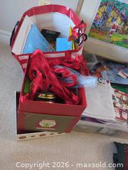 MaxSold Auction: Holiday Decorations Lot with Santa Figures, Wrapping & Linens - Saanich (British Columbia, Canada) PARTNER MANAGED Moving Online Auction - Cordova Bay Road (CONDO)