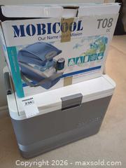 MaxSold Auction: Mobicool T08 8L 12V Portable Cooler + Large 20–30L Ice Chest - Saanich (British Columbia, Canada) PARTNER MANAGED Moving Online Auction - Cordova Bay Road (CONDO)