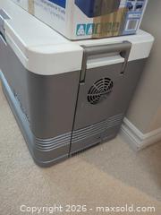 MaxSold Auction: Mobicool T08 8L 12V Portable Cooler + Large 20–30L Ice Chest - Saanich (British Columbia, Canada) PARTNER MANAGED Moving Online Auction - Cordova Bay Road (CONDO)