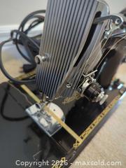 MaxSold Auction: Singer Vintage Mechanical Sewing Machine, Black - Saanich (British Columbia, Canada) PARTNER MANAGED Moving Online Auction - Cordova Bay Road (CONDO)
