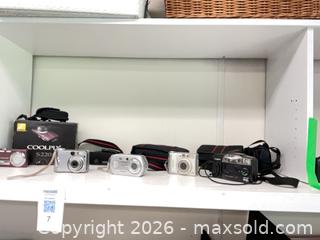 MaxSold Auction: Lot of 2-5 Nikon Coolpix Digital Point-and-Shoot Cameras - St. Catharines (Ontario, Canada) SELLER MANAGED Charity/Fundraising Online Auction - Broadway Avenue