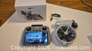 MaxSold Auction: DJI Flip Drone with Controller (Gray) - Toronto (Ontario, Canada) PARTNER MANAGED Estate Sale Online Auction - Yorkville Avenue (CONDO) PART 2