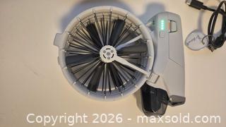 MaxSold Auction: DJI Flip Drone with Controller (Gray) - Toronto (Ontario, Canada) PARTNER MANAGED Estate Sale Online Auction - Yorkville Avenue (CONDO) PART 2