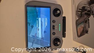 MaxSold Auction: DJI Flip Drone with Controller (Gray) - Toronto (Ontario, Canada) PARTNER MANAGED Estate Sale Online Auction - Yorkville Avenue (CONDO) PART 2