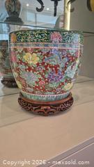 MaxSold Auction: Famille Rose Porcelain Planter with Wooden Base, 11 in. - Toronto (Ontario, Canada) PARTNER MANAGED Estate Sale Online Auction - Yorkville Avenue (CONDO) PART 2