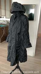 MaxSold Auction: Issey Miyake Black Nylon Hooded Raincoat Size 4 (Japanese), Comes with Certificate of Authenticity - Toronto (Ontario, Canada) PARTNER MANAGED Estate Sale Online Auction - Yorkville Avenue (CONDO) PART 2