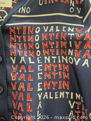 MaxSold Auction: New With Tags Valentino Navy/Red/Cream Archive Logo Silk-Panel Virgin Wool Cardigan (M), with Certificate of Authenticity - Toronto (Ontario, Canada) PARTNER MANAGED Estate Sale Online Auction - Yorkville Avenue (CONDO) PART 2