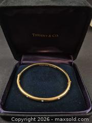 MaxSold Auction: Tiffany & Co. 18K Yellow Gold & Platinum Diamond Bangle Bracelet 39.3 grams with Certificate of Appraisal (Lot 1 of 2) - Toronto (Ontario, Canada) PARTNER MANAGED Estate Sale Online Auction - Yorkville Avenue (CONDO) PART 2