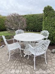 MaxSold Auction: Hauser Cast  Round Outdoor Dining Set - Ottawa (Ontario, Canada) PARTNER MANAGED Downsizing Online Auction - Hamelin Crescent
