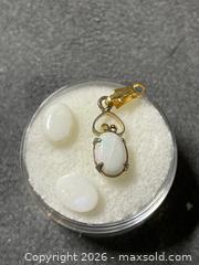 MaxSold Auction: 12K Gold-Filled Pendant with White Oval Opal Cabochon + 2 Loose Oval Opals - Antioch (California, USA) SELLER MANAGED Downsizing Online Auction -  Mahogany Way (STORAGE)