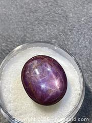 MaxSold Auction: 16.5 ct Purple Star Ruby Oval Cabochon - Antioch (California, USA) SELLER MANAGED Downsizing Online Auction -  Mahogany Way (STORAGE)