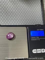 MaxSold Auction: 16.5 ct Purple Star Ruby Oval Cabochon - Antioch (California, USA) SELLER MANAGED Downsizing Online Auction -  Mahogany Way (STORAGE)