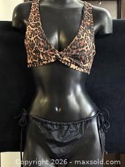 MaxSold Auction: ASOS DESIGN Leopard & Black Two-Piece Bikini Size: 6  - Antioch (California, USA) SELLER MANAGED Downsizing Online Auction -  Mahogany Way (STORAGE)
