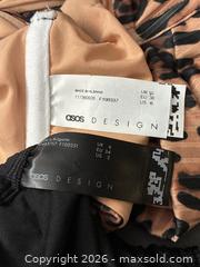 MaxSold Auction: ASOS DESIGN Leopard & Black Two-Piece Bikini Size: 6  - Antioch (California, USA) SELLER MANAGED Downsizing Online Auction -  Mahogany Way (STORAGE)