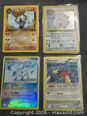 MaxSold Auction: Lot of 4- Mixed Holo & Regular Pokémon Trading Cards (1st Edition- Dark Machoke) - Antioch (California, USA) SELLER MANAGED Downsizing Online Auction -  Mahogany Way (STORAGE)