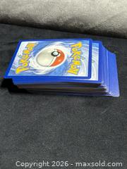 MaxSold Auction: Mystery Lot of 51-100 Pokémon TCG Cards- Unsearched - Antioch (California, USA) SELLER MANAGED Downsizing Online Auction -  Mahogany Way (STORAGE)