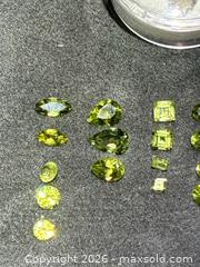 MaxSold Auction: Peridot & Emerald Mixed Cut Gemstone Lot, (33 Pieces) - Antioch (California, USA) SELLER MANAGED Downsizing Online Auction -  Mahogany Way (STORAGE)