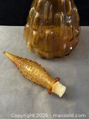 MaxSold Auction: Vintage- Empoli Italy Amber Raised Brick Genie Decanter Very Tall 22" - Antioch (California, USA) SELLER MANAGED Downsizing Online Auction -  Mahogany Way (STORAGE)
