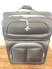 MaxSold Auction: “Atlantic” Black Medium Softside Rolling Suitcase with Wheels & Telescoping Handle - North Las Vegas (Nevada, USA) SELLER MANAGED Reseller Online Auction -  Rockpebble Avenue