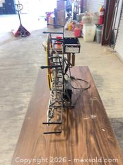 MaxSold Auction: Foster's Neon Advertising Sign, Metal Frame - North Las Vegas (Nevada, USA) SELLER MANAGED Reseller Online Auction -  Rockpebble Avenue