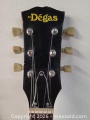 MaxSold Auction: Dégas Double-Cut SG-Style Electric Guitar, Cherry Wine Red - Toronto (Ontario, Canada) PARTNER MANAGED Reseller Online Auction - Queen Street West