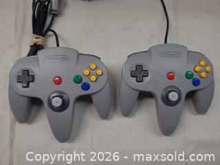 MaxSold Auction: Nintendo 64 NUS-001 Control Deck with 2 Wired Controllers - Toronto (Ontario, Canada) PARTNER MANAGED Reseller Online Auction - Queen Street West