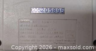 MaxSold Auction: Nintendo Game Boy DMG-01 and GameCube Wired Controller - Toronto (Ontario, Canada) PARTNER MANAGED Reseller Online Auction - Queen Street West