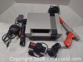 MaxSold Auction: Nintendo NES-001 Front-Loading Console with Controller & Zapper - Toronto (Ontario, Canada) PARTNER MANAGED Reseller Online Auction - Queen Street West