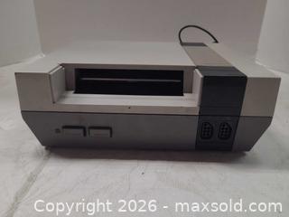 MaxSold Auction: Nintendo NES-001 Front-Loading Console with Controller & Zapper - Toronto (Ontario, Canada) PARTNER MANAGED Reseller Online Auction - Queen Street West