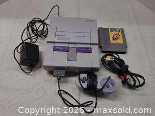 MaxSold Auction: Nintendo Super Nintendo (SNES) SNS-001 Console with Controller & Cartridge - Toronto (Ontario, Canada) PARTNER MANAGED Reseller Online Auction - Queen Street West