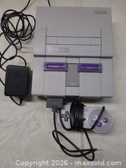 MaxSold Auction: Nintendo Super Nintendo (SNES) SNS-001 Console with Controller & Cartridge - Toronto (Ontario, Canada) PARTNER MANAGED Reseller Online Auction - Queen Street West