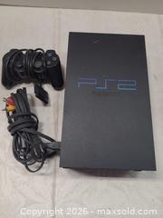 MaxSold Auction: Sony PlayStation 2 (SCPH-50001) NTSC U/C Black - Toronto (Ontario, Canada) PARTNER MANAGED Reseller Online Auction - Queen Street West