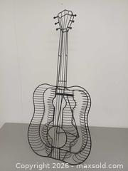 MaxSold Auction: Vintage Guitar Shape Metal Openwork CD Holder Rack - Toronto (Ontario, Canada) PARTNER MANAGED Reseller Online Auction - Queen Street West