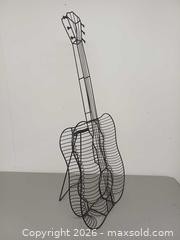 MaxSold Auction: Vintage Guitar Shape Metal Openwork CD Holder Rack - Toronto (Ontario, Canada) PARTNER MANAGED Reseller Online Auction - Queen Street West