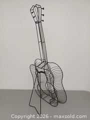 MaxSold Auction: Vintage Guitar Shape Metal Openwork CD Holder Rack - Toronto (Ontario, Canada) PARTNER MANAGED Reseller Online Auction - Queen Street West