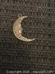 MaxSold Auction: 14k gold moon with a face pendant  - Phoenix (Arizona, USA) PARTNER MANAGED Downsizing Online Auction - West Northern Avenue (STORAGE)