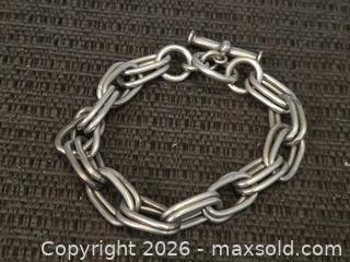MaxSold Auction: Heavy sterling silver bracelet  - Phoenix (Arizona, USA) PARTNER MANAGED Downsizing Online Auction - West Northern Avenue (STORAGE)