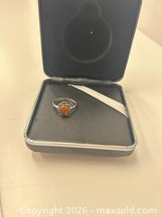 MaxSold Auction: Silver Ring with Orange Amber or Citrine Gemstone - Richmond (British Columbia, Canada) SELLER MANAGED Downsizing Online Auction -  Bridgeport Road