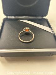 MaxSold Auction: Silver Ring with Orange Amber or Citrine Gemstone - Richmond (British Columbia, Canada) SELLER MANAGED Downsizing Online Auction -  Bridgeport Road