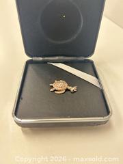 MaxSold Auction: Silver Turtle Pendant  - Richmond (British Columbia, Canada) SELLER MANAGED Downsizing Online Auction -  Bridgeport Road