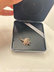 MaxSold Auction: Silver Turtle Pendant  - Richmond (British Columbia, Canada) SELLER MANAGED Downsizing Online Auction -  Bridgeport Road