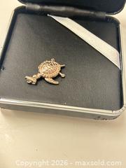 MaxSold Auction: Silver Turtle Pendant  - Richmond (British Columbia, Canada) SELLER MANAGED Downsizing Online Auction -  Bridgeport Road