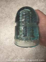 MaxSold Auction: GTP TEL CO. lot of 10 vintage utility company glass insulators.  - Red Deer (Alberta, Canada) SELLER MANAGED Downsizing Online Auction - Dempsey Street