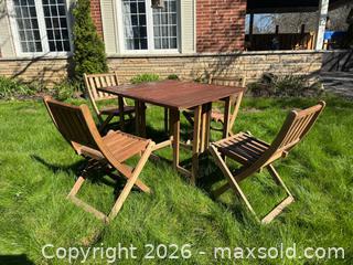 MaxSold Auction: Outdoor wood patio set - table and 4 folding chairs - Toronto (Ontario, Canada) SELLER MANAGED Reseller Online Auction - Kempsell Crescent