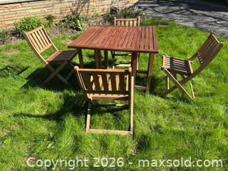 MaxSold Auction: Outdoor wood patio set - table and 4 folding chairs - Toronto (Ontario, Canada) SELLER MANAGED Reseller Online Auction - Kempsell Crescent